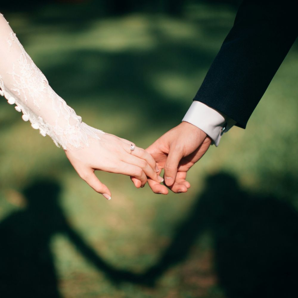 Brian & Mia holding hands